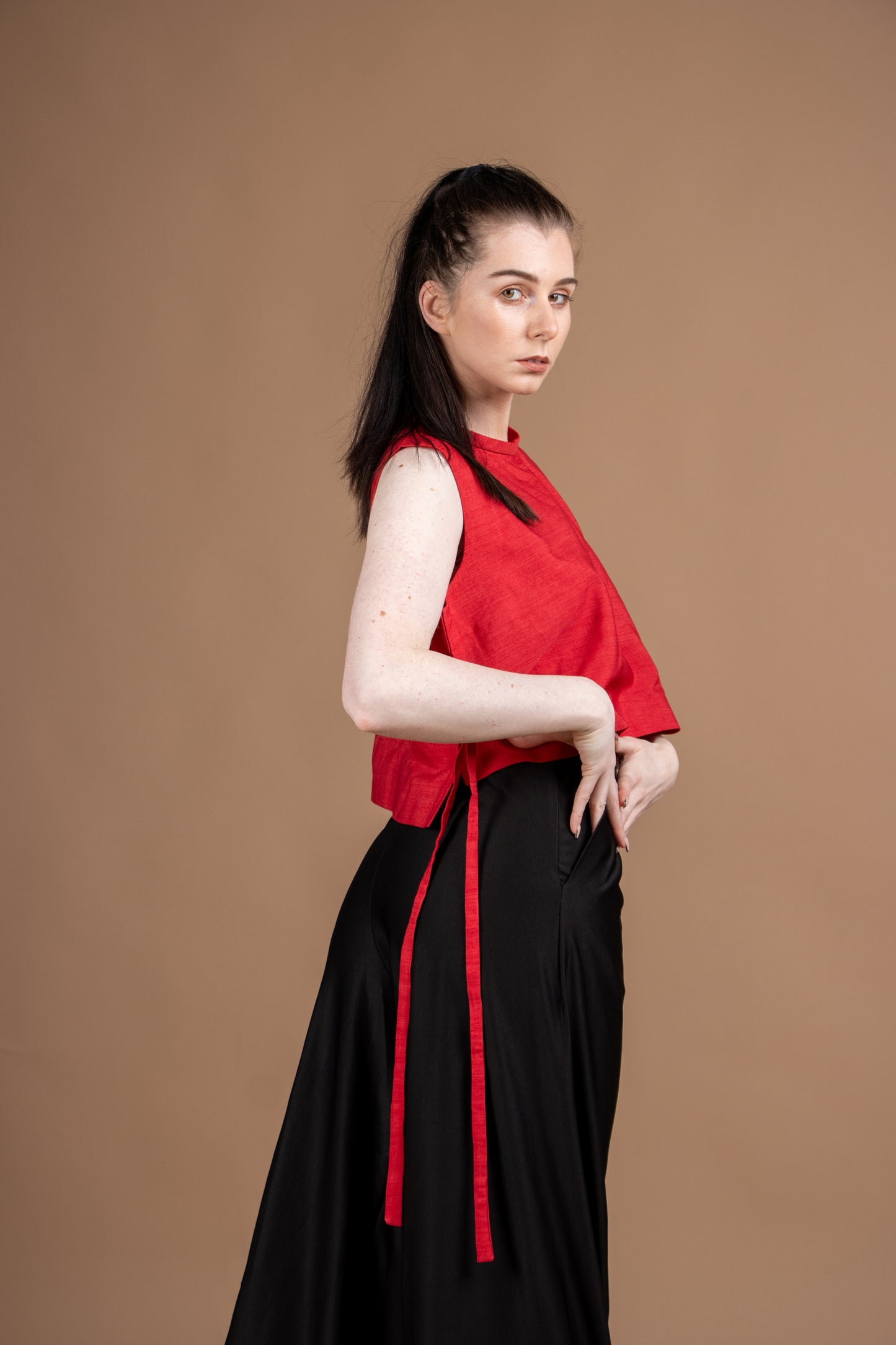 Red sleeveless top