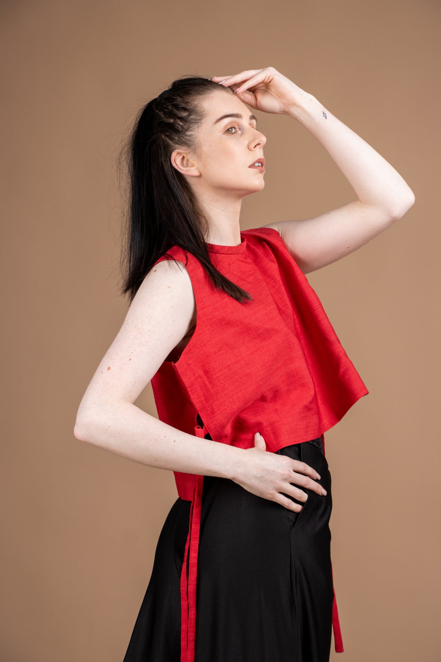 Red sleeveless top